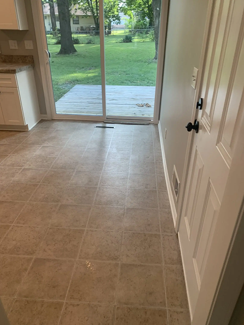 Kitchen area with sliding glass door view.